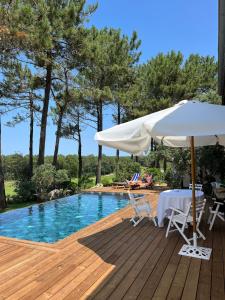 Villas Villa Hau-Oli, 4 chambres, spacieuse, piscine privee, grand jardin fleuri vue golf et 8min a pied de la plage : photos des chambres