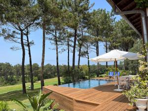 Villas Villa Hau-Oli, 4 chambres, spacieuse, piscine privee, grand jardin fleuri vue golf et 8min a pied de la plage : photos des chambres