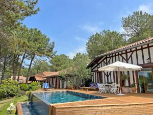 Villas Villa Hau-Oli, 4 chambres, spacieuse, piscine privee, grand jardin fleuri vue golf et 8min a pied de la plage : photos des chambres