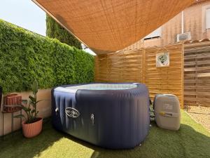 Appartements Charmante Maison avec Jacuzzi et Parking : photos des chambres