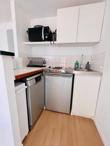 Appartements Ch-ti Lillois - Appartement 1 chambre Vieux Lille Parking : photos des chambres