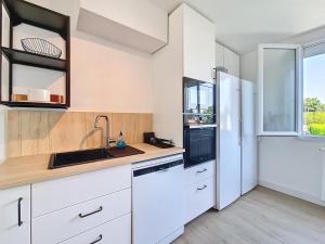 Appartements L-Urbaine, Maison de ville spacieuse, Jardin, WIFI : photos des chambres
