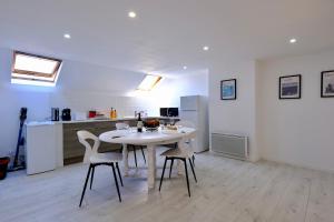 Appartements Verneuil - Cine Room : photos des chambres