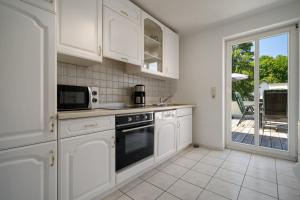 Ferienwohnung Strandglück am Malchower See mit Garten