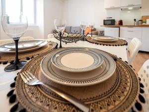 Appartements La Pause Boheme Deco boisee en Centre Bourg : photos des chambres