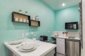 Appartements Charme et cosy en hypercentre : photos des chambres