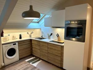 Appartements La Petite Mansarde : photos des chambres