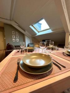Appartements La Petite Mansarde : photos des chambres