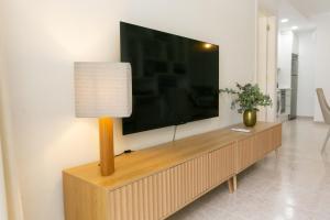 Doble apartamento junto a la playa