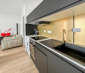 Appartements Appartement moderne avec terrasse et vue mer : photos des chambres