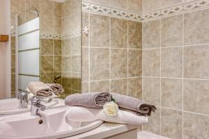 Appartements Ideal famille - Terrasse, clim et parking prive : photos des chambres