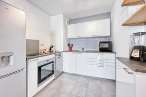 Appartements Ideal famille - Terrasse, clim et parking prive : photos des chambres