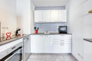 Appartements Ideal famille - Terrasse, clim et parking prive : photos des chambres