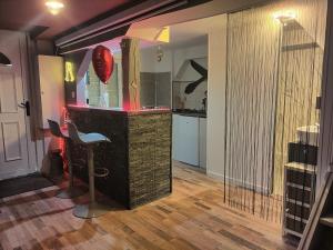 Appartements Jacuzzi Au plaisir amoureux : photos des chambres