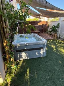 Rez de jardin cosy & jacuzzi