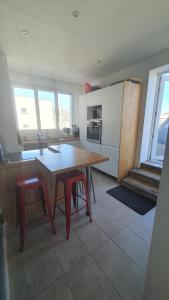 Appartements T4 centre ville avec terrasse : photos des chambres