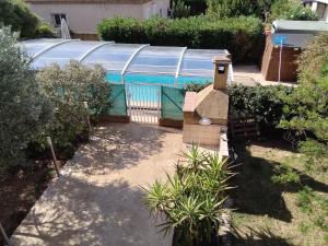 Appartements Havre de paix au coeur du Sud appartement cosy climatise piscine privee entre mer et tresors du Languedoc : photos des chambres
