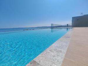 Appartements SEA SIDE - Rooftop Pool SeaView : photos des chambres