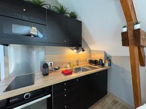 Appartements Le petit Merinos - Rambouillet - : photos des chambres