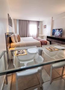 Coral Ritz - Flat beira mar (Condomínio Ritz Suites Home Service)