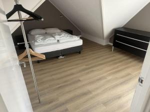 Holiday home in Hollum with barbecue