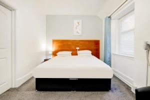 Deluxe Quad room room in OYO Eastbank Hotel
