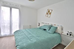 Maisons de vacances La Maison d-Iris - Proche Golf et RER A : photos des chambres