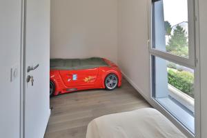 Maisons de vacances La Maison d-Iris - Proche Golf et RER A : photos des chambres