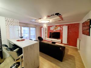 Appartements Le Petit Versailles : photos des chambres