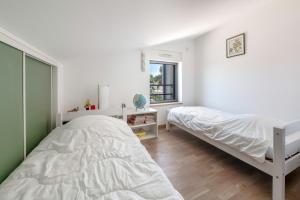 Maisons de vacances Villa pour 15 a 700m de la plage : photos des chambres