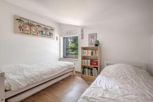 Maisons de vacances Villa pour 15 a 700m de la plage : photos des chambres