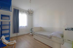 Maisons de vacances House with garden - residential neighborhood : photos des chambres