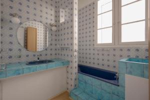 Maisons de vacances House with garden - residential neighborhood : photos des chambres