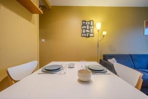 Appartements Yellow Flip-Flops Apartment : photos des chambres