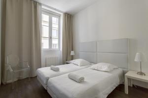 Appartements Le Jacquard Appartement 60m2 2 chambres Garage Lyon Centre : photos des chambres