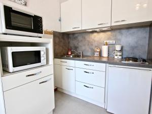 Appartements Studio cosy au pied des pistes a Chamrousse, balcon sud, ideal pour 4 personnes - FR-1-340-148 : photos des chambres