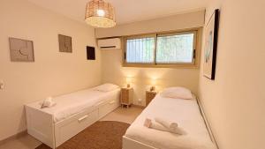 Villas Villa avec Rooftop, Jacuzzi & vue mer by Palmazur : photos des chambres