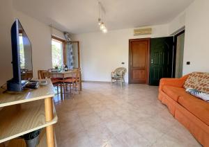 Appartamento fronte mare con veranda Orata