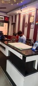 A budget hotel shiva palace near Ganesh ghat , amrapur ghat