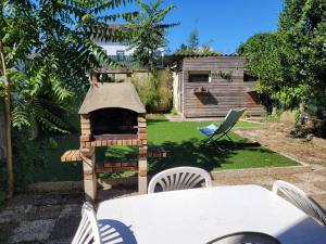 Sejours chez l'habitant Maison jardin 4 chambres Parking Gratuit : photos des chambres