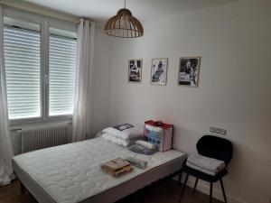 Sejours chez l'habitant Maison jardin 4 chambres Parking Gratuit : photos des chambres