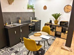 Appartements L'Alcove - Centre-ville - Moderne & Cosy - Commerces a Proximite : photos des chambres