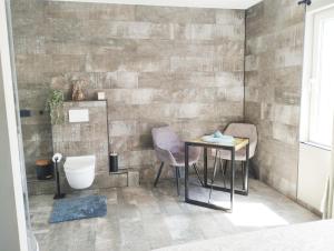 Luxe kamer met stoomsauna bij B&B Gezond aan Zee - Toegang bad en buiten Wellness tegen meerprijs