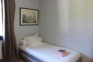 Maisons de vacances SAS Loudenne Gouache, Ecottage Walter dans le parc de Loudenne : photos des chambres