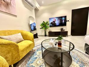 Studio with master bed and 654k screen