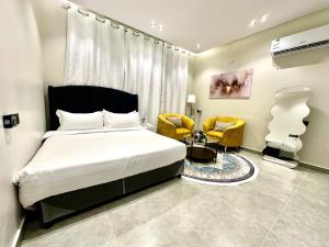 Studio with master bed and 654k screen