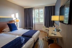 Hotels Logis Hotel & Restaurant - Les Tuileries : photos des chambres