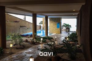 Flats em prédio beira mar Ponta Negra Mirador - Qavi