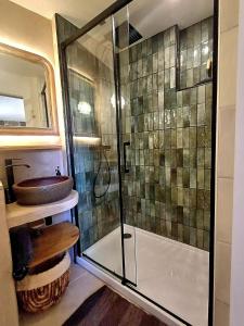 Appartements Centre village, appartement en RDC : photos des chambres