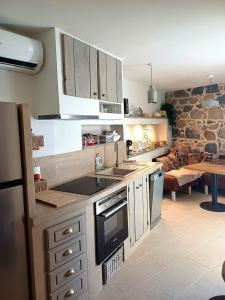 Appartements Centre village, appartement en RDC : photos des chambres